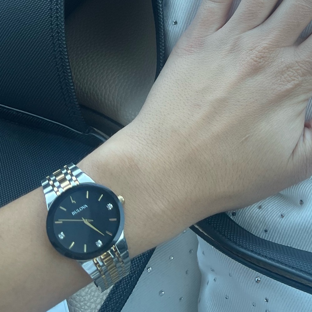 Bulova Silver and Gold Watch with Black Dial